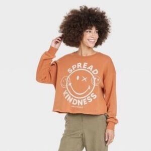 Smiley World Spread Kindness Rust Ora Cropped Pullover Sweatshirt | L